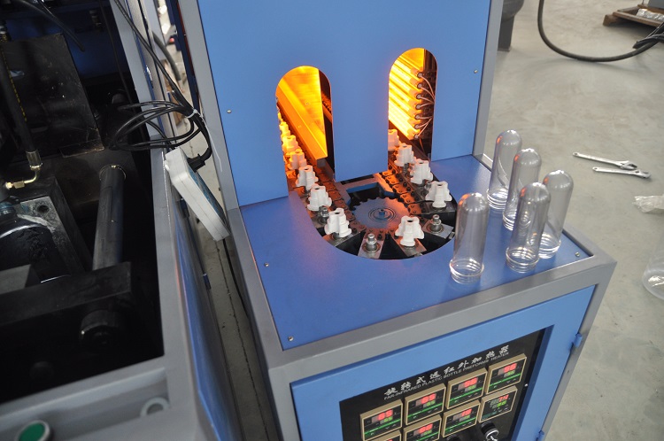 Semi Automatic 400 - 1200BPH 3 - 6L PET Bottle Stretch Blow Moilding Machine